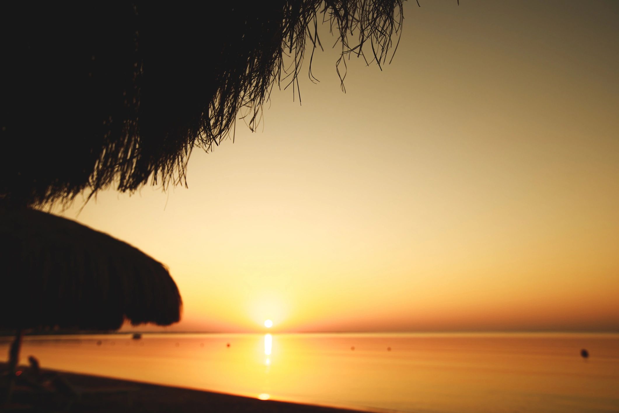 Warm sunset scene evoking a premium getaway