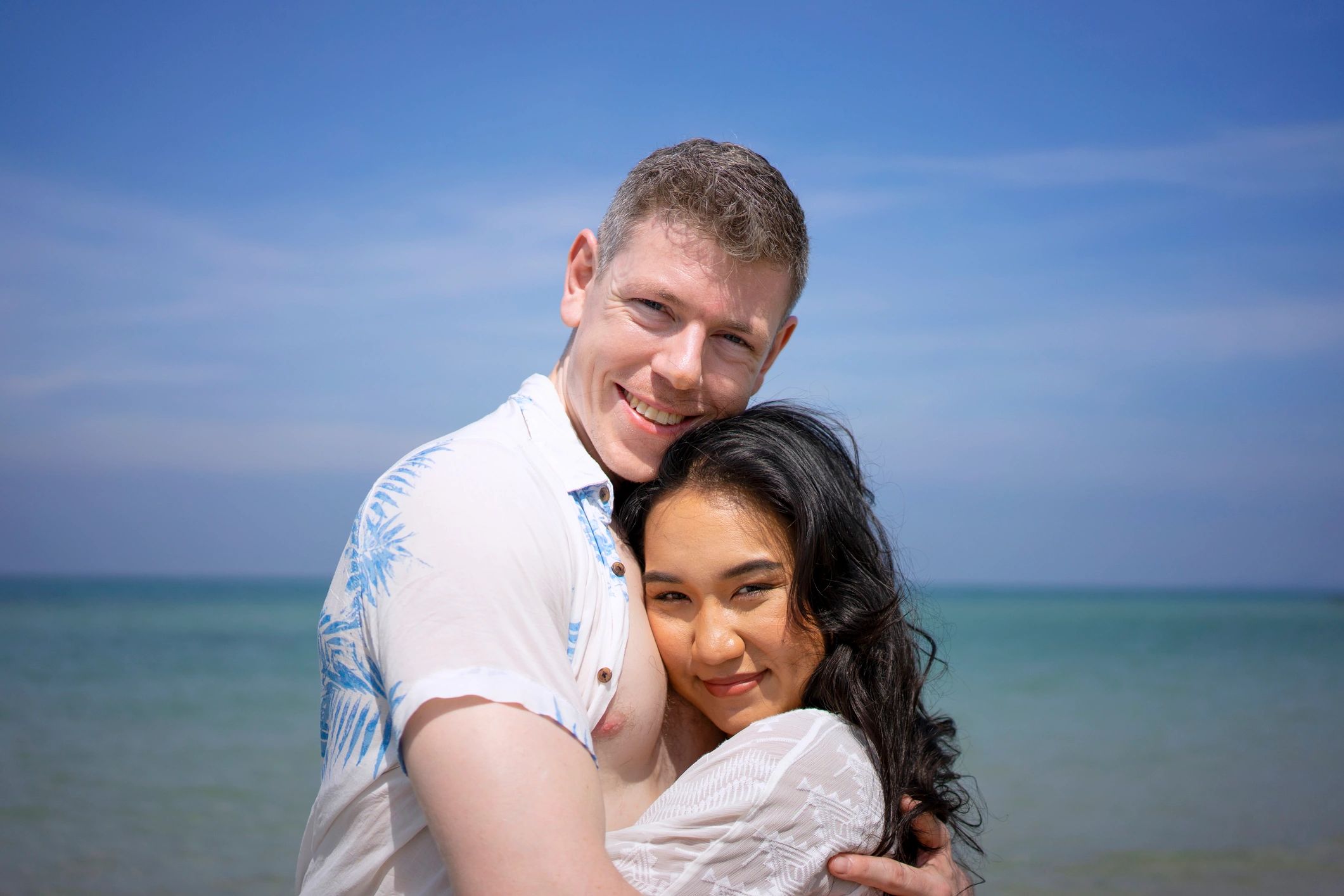 Couple enjoying a romantic destination setting by the beach