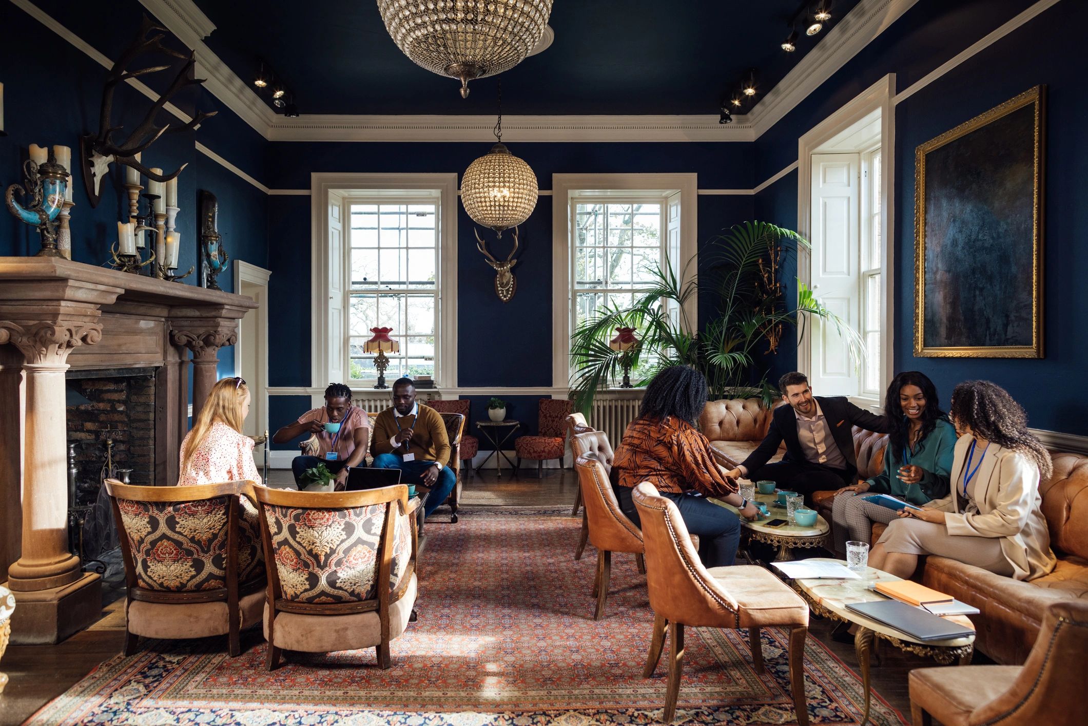 Professionals networking in a hotel conference venue
