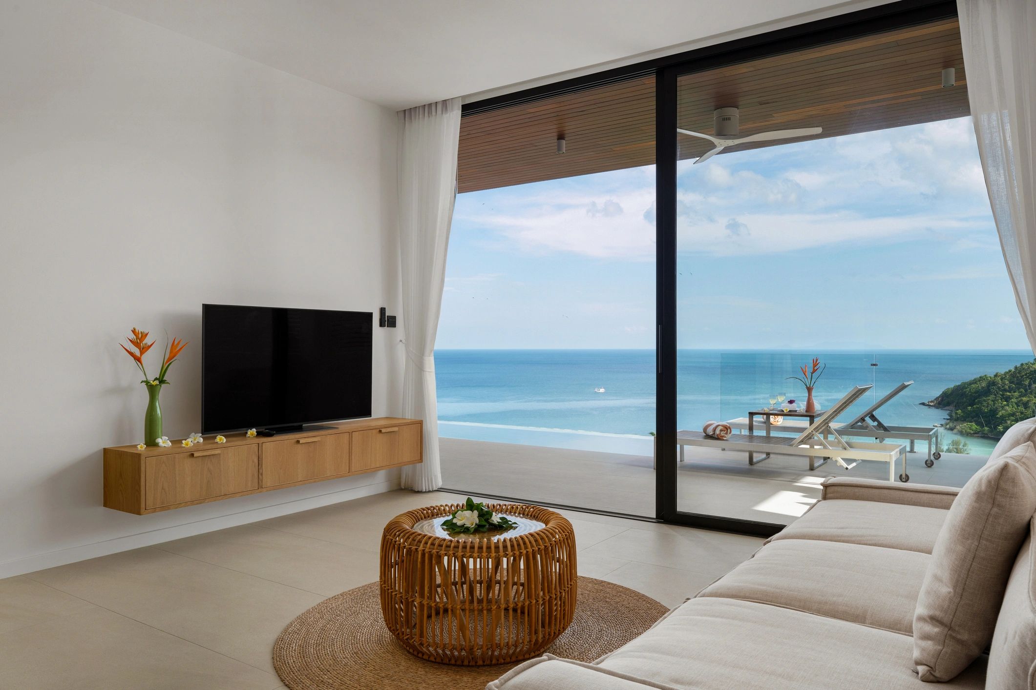 Elegant tropical villa living room with ocean view